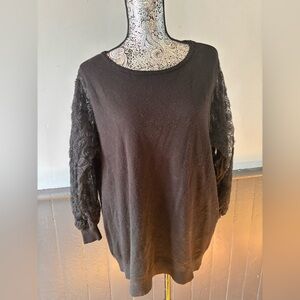 Sioni Black Top with Floral Detail